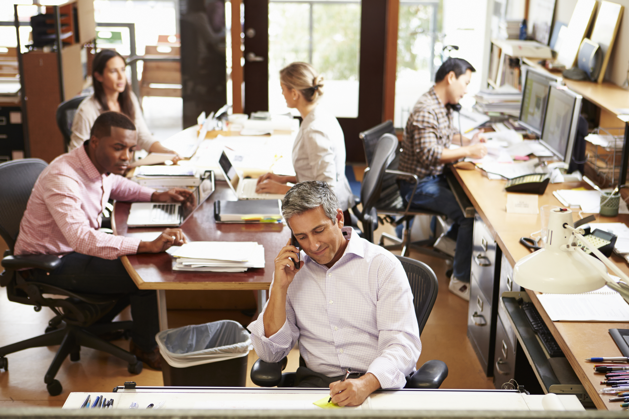 interior-of-busy-architect-s-office-with-staff-working-38629042